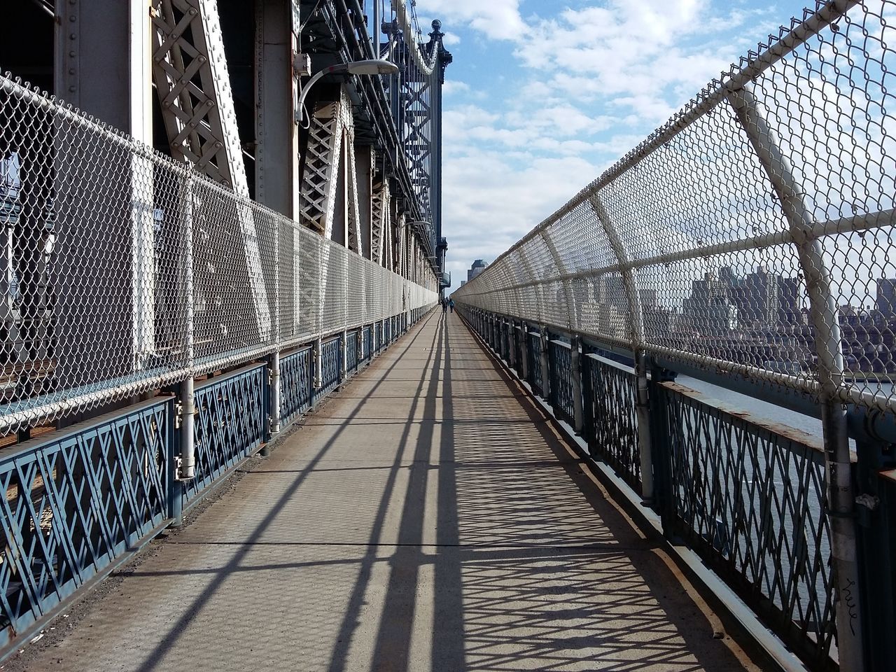 walking down the manhattan bridge. · New York City New York New York ⤠NYC USA bridge Architecture steel Lines diagonals Perspective horizon infinity light and shadow urban landscape The Purist (no edit, no filter)