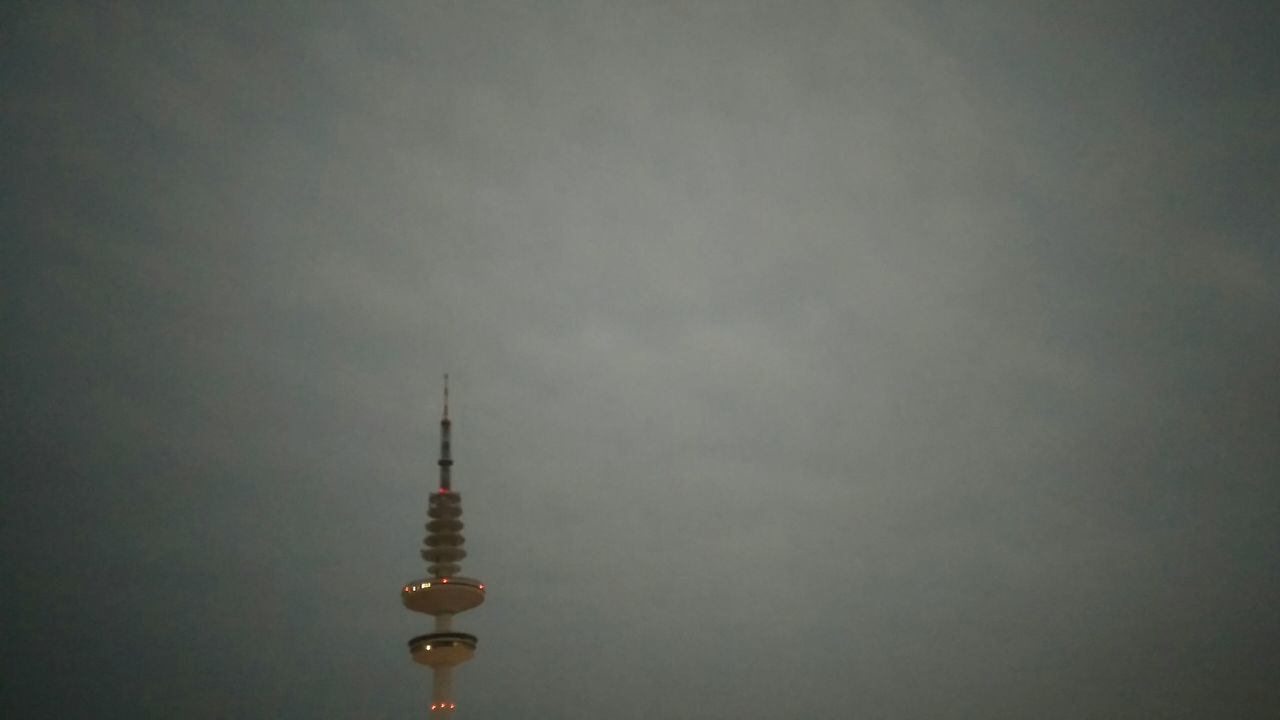 Heinrich-Hertz-Turm Hamburg. · germany hh 040 messeturm Radio tower tower landmark Architecture iconic urban landscape Lights dusk nightfall Gray Sky Cloudy day clouds and sky Light Pollution